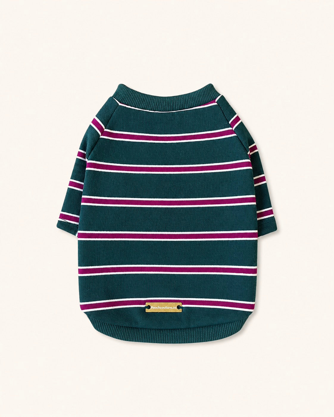 A long-sleeve knit pet sweater with horizontal stripes in dark teal green, magenta pink, and white, laid flat on a light cream background.