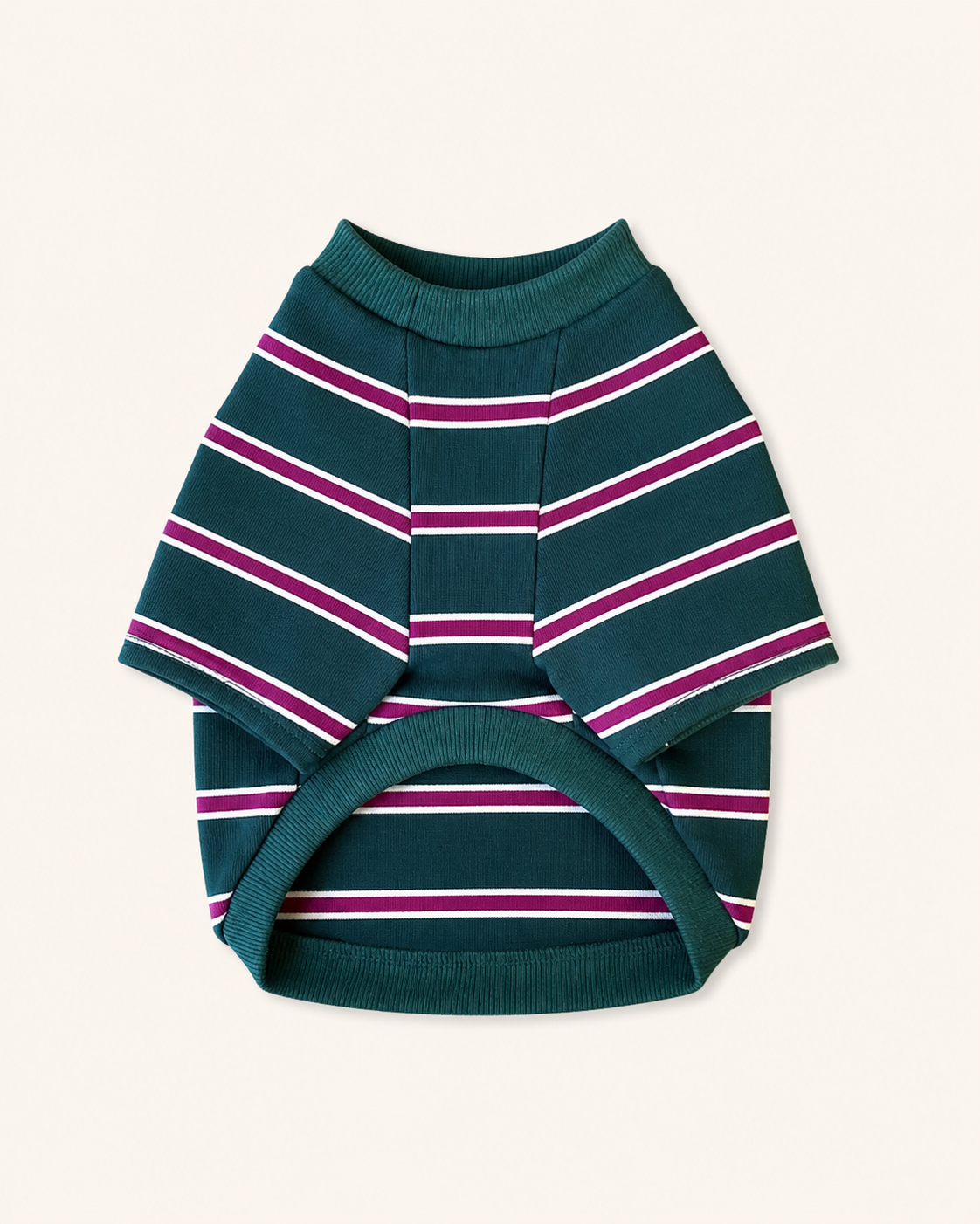 A dark teal pet sweater with horizontal pink and white stripes, laid flat on a light cream background.